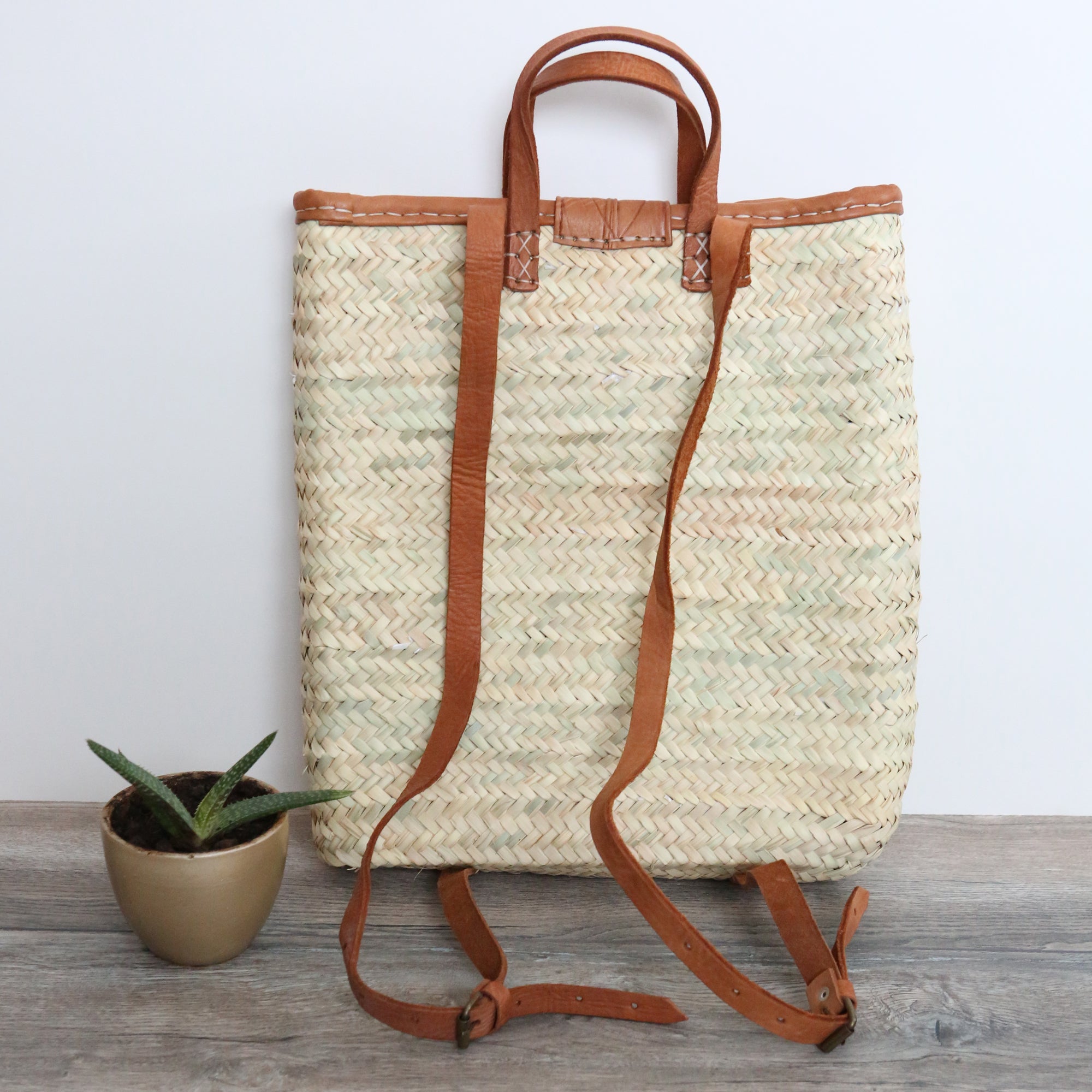 The "Autumn" straw and leather backpack