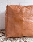 Special listing for Leather Ottoman in Tan