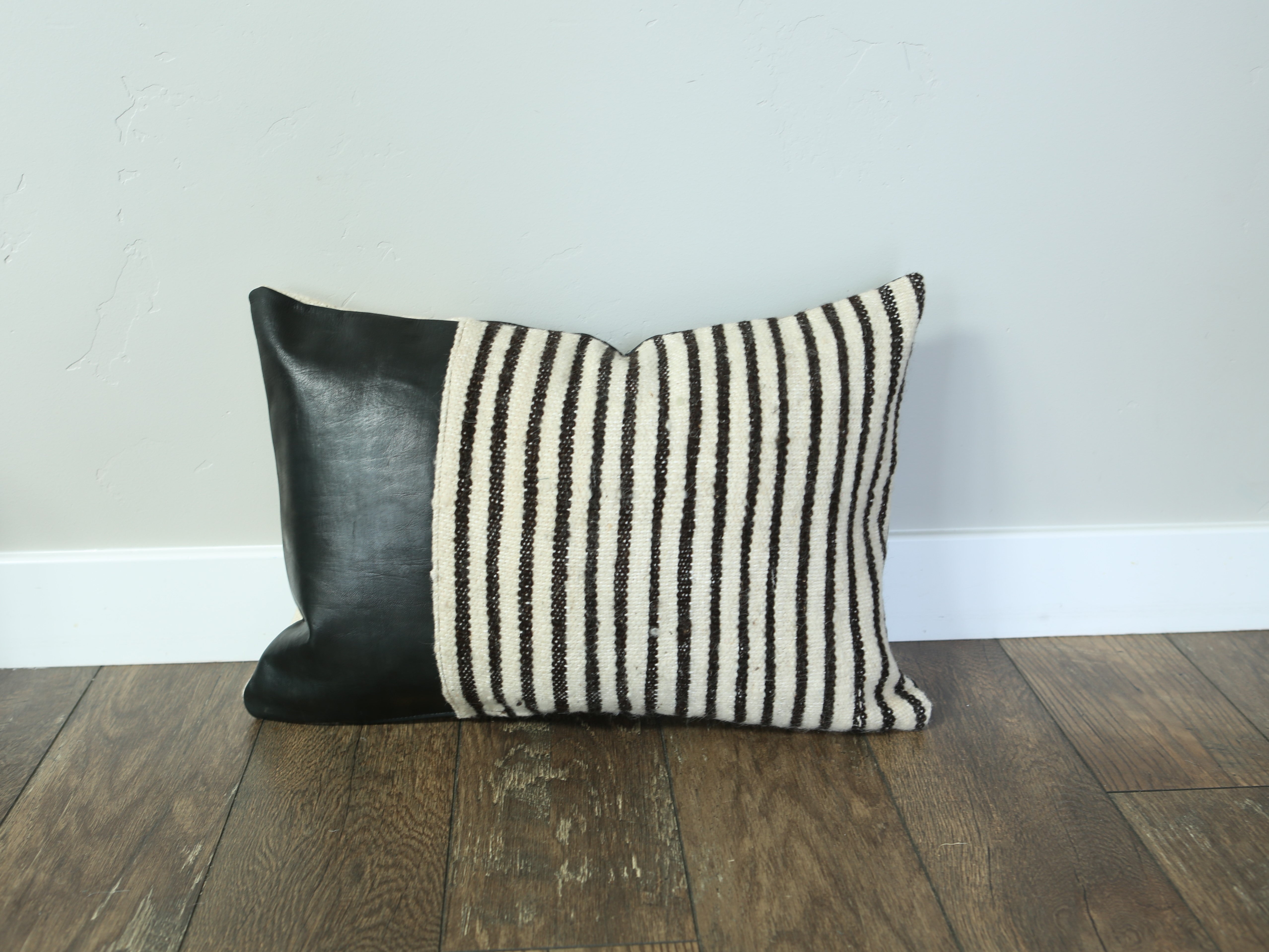 Black Leather and Striped Wool Pillow
