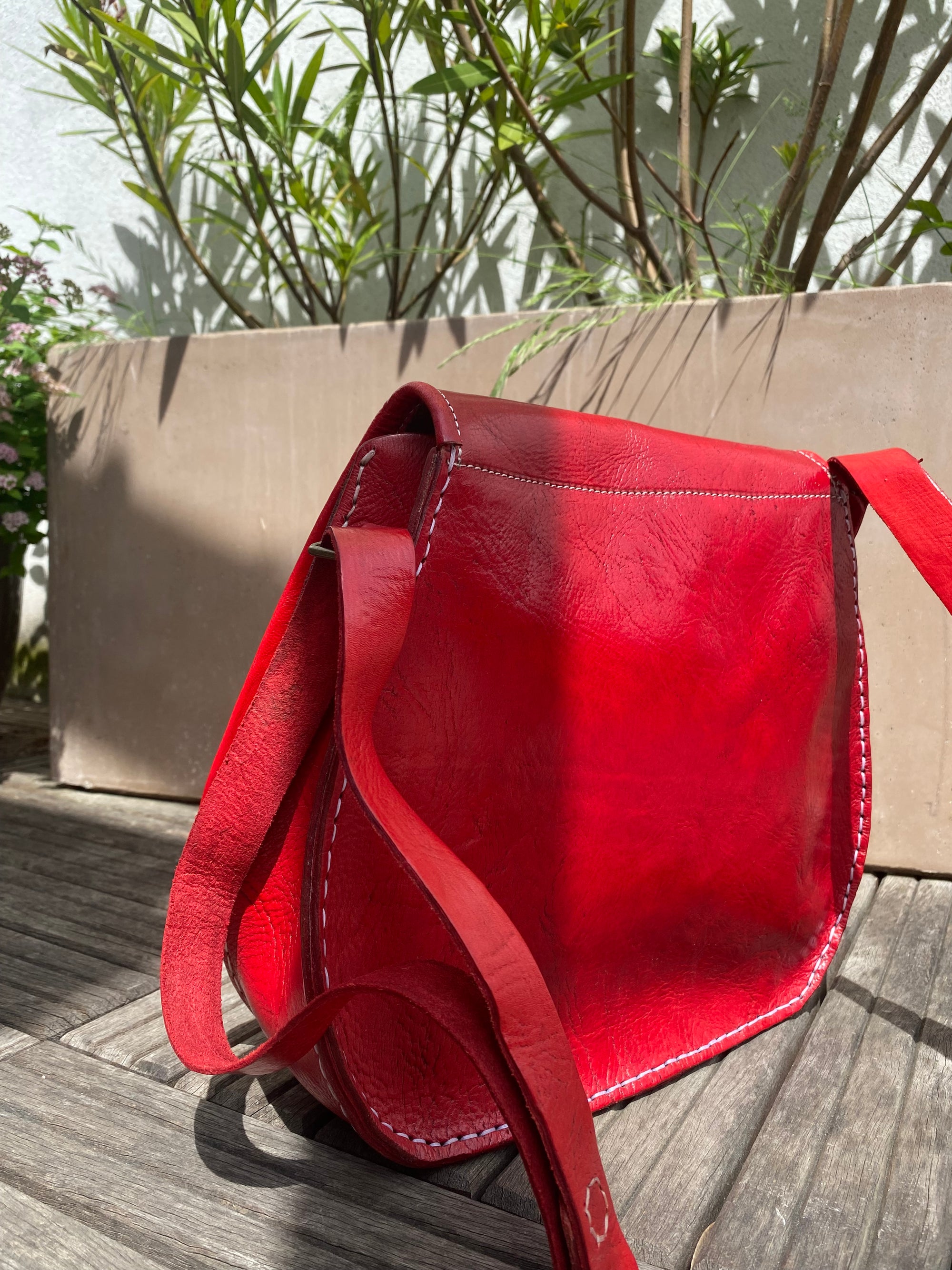 Red leather half moon handbag - backside photo