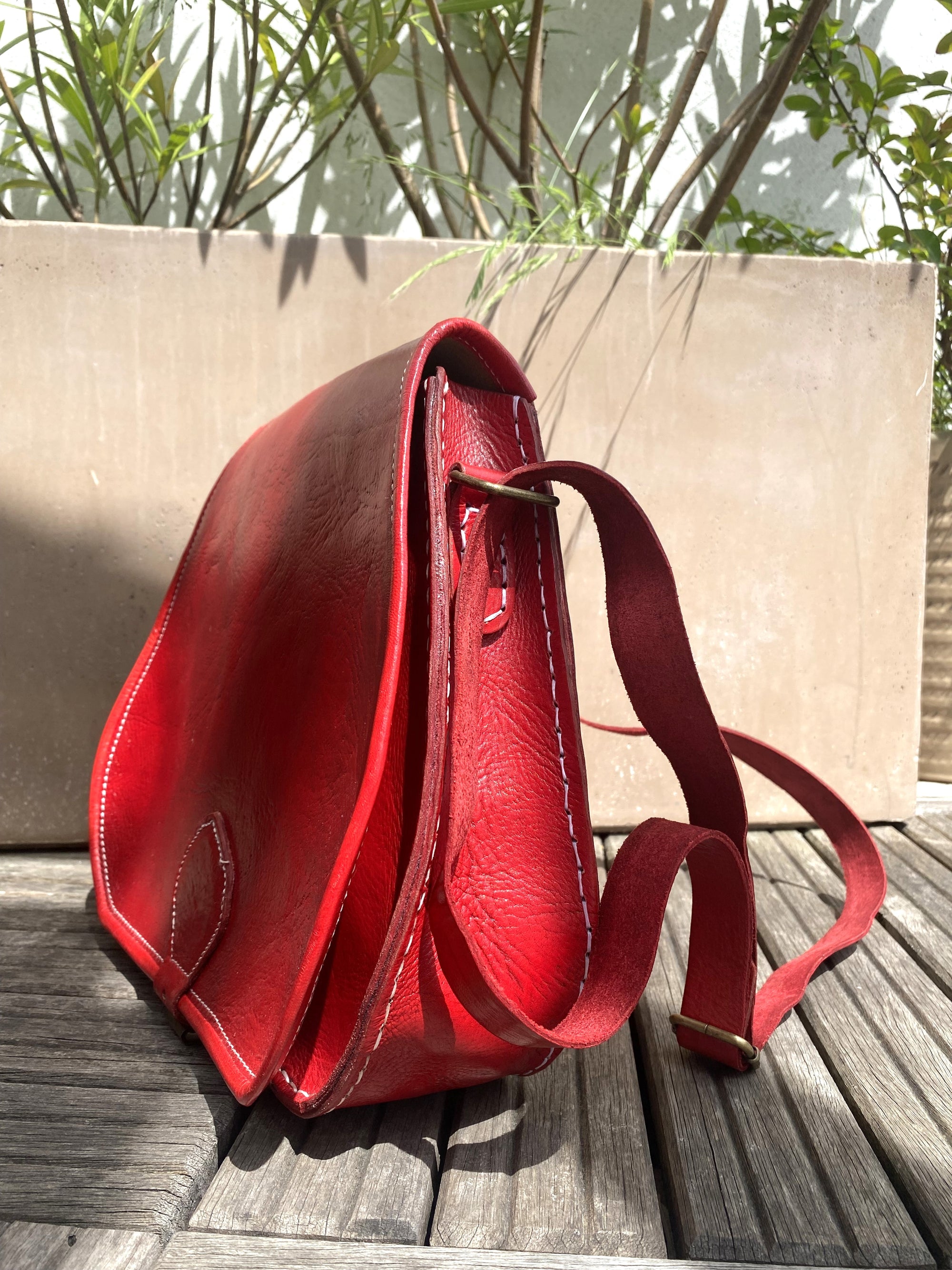 Red leather handback side view 