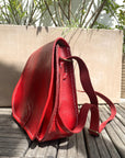 Red leather handback side view 